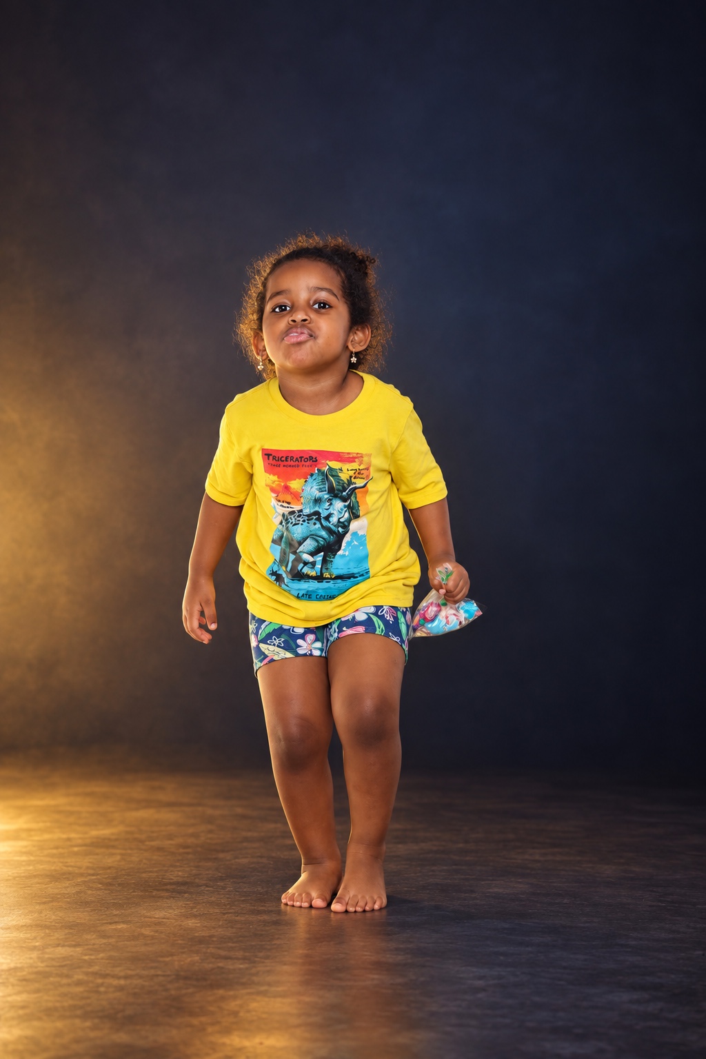 Child portrait against a studio backdrop