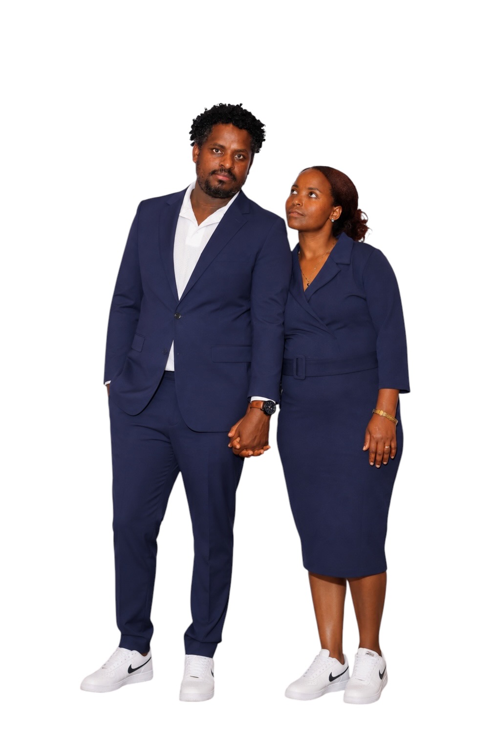 Couple portrait against a light backdrop