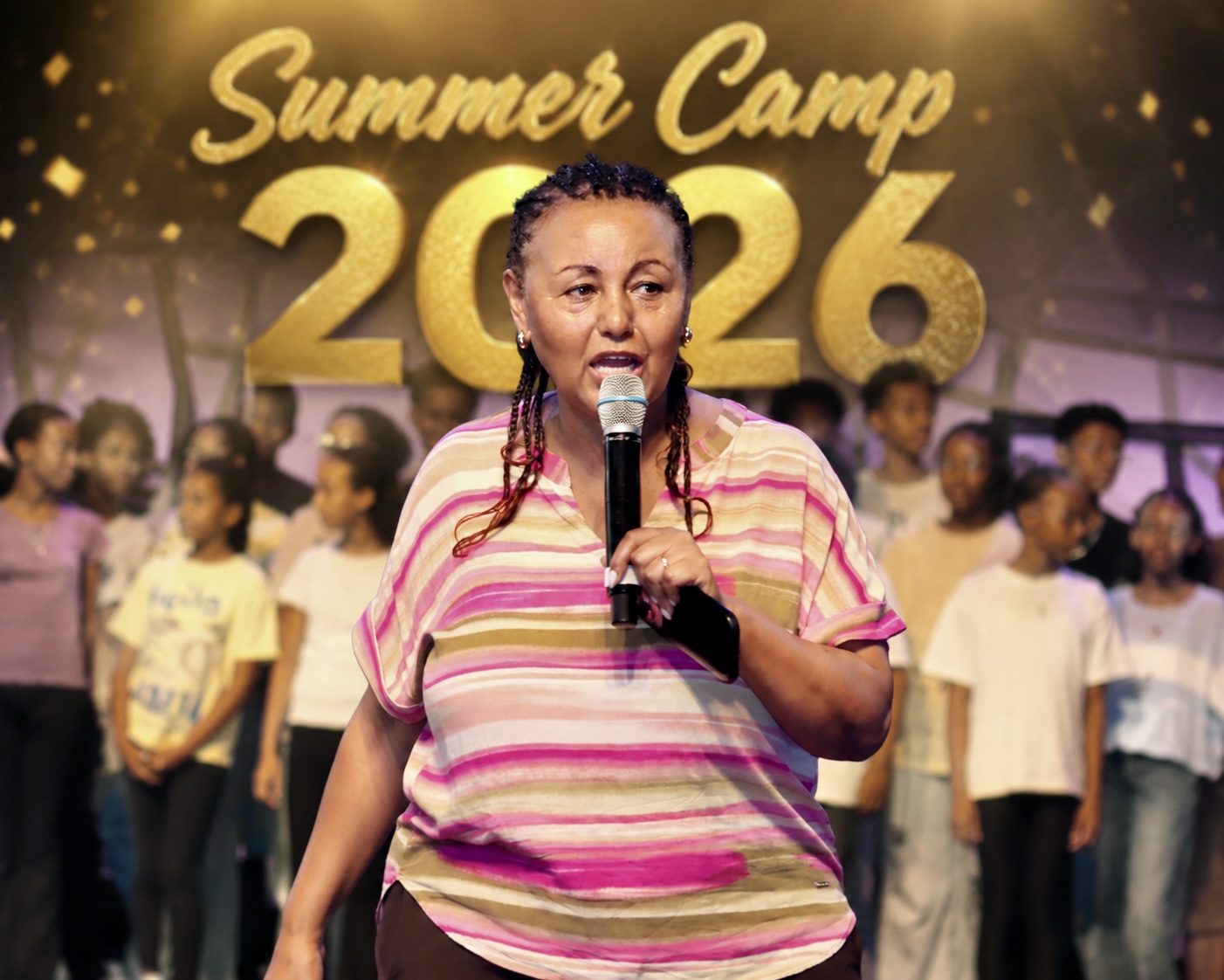 Summer camp stage program with a speaker and choir